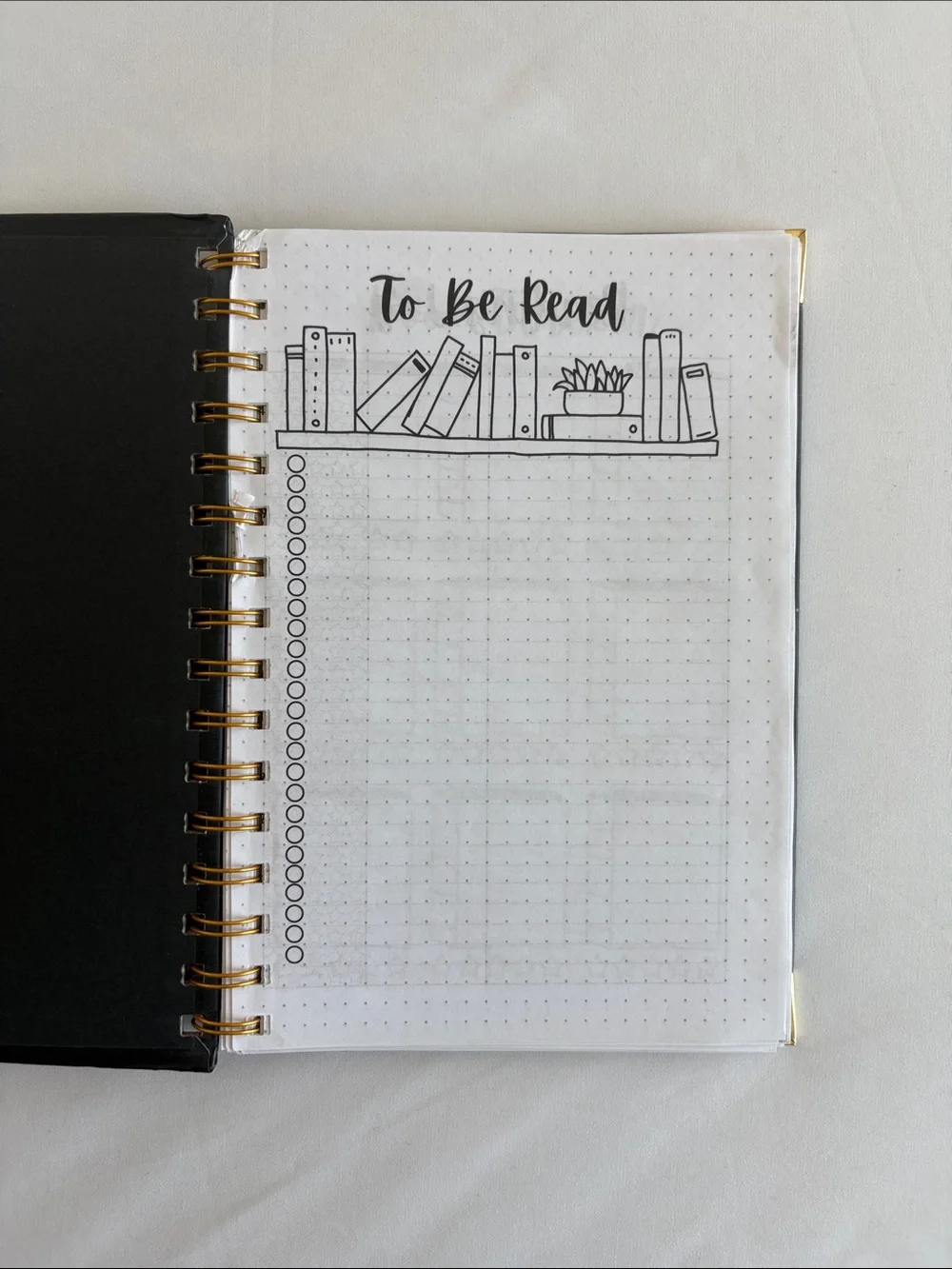 Bullet Journal Game Spiral Notebook in Black with Colored Pencils